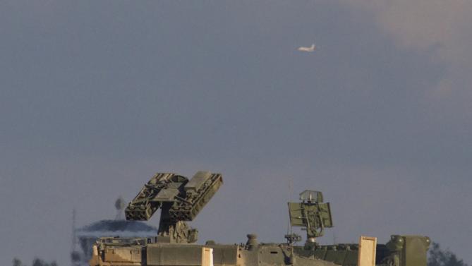 Russian Strela 10 anti aircraft launcher takes position during the Army-2015 show at a shooting range in Alabino, outside of Moscow, Russia, on Tuesday, June 16, 2015. Russia’s military this year alone will receive over 40 new intercontinental ballistic missiles capable of piercing any missile defences, President Vladimir Putin said Tuesday in a blunt reminder of the nation’s nuclear might amid tensions with the West over Ukraine. (AP Photo/Ivan Sekretarev)