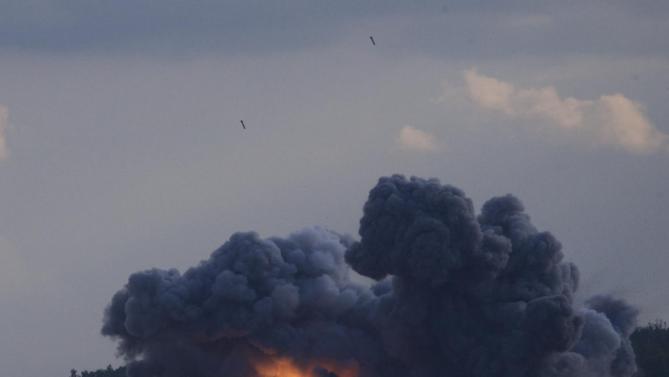 Russian TOS-1A Solntsepyok (Sunheat) heavy flame throwing launcher&#39;s rockets explode during the Army-2015 show at a shooting range in Alabino, outside of Moscow, Russia, on Tuesday, June 16, 2015. Russia’s military this year alone will receive over 40 new intercontinental ballistic missiles capable of piercing any missile defences, President Vladimir Putin said Tuesday in a blunt reminder of the nation’s nuclear might amid tensions with the West over Ukraine. (AP Photo/Ivan Sekretarev)